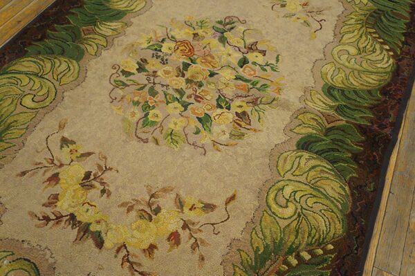 Close-up of a beige rug with yellow floral bouquets and green scrolling borders, by rugs on net