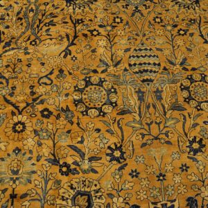 Close-up of a gold and navy floral rug pattern by Rugs On Net. by Rugs On Net