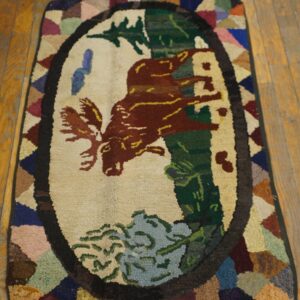 Hooked rug featuring a moose in a natural scene, by Rugs On Net