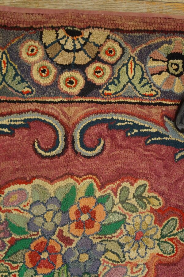 Close-up of a colorful floral hook rug pattern by rugs on net