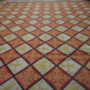 Diamond patterned rug with red and cream tiles by Rugs On Net