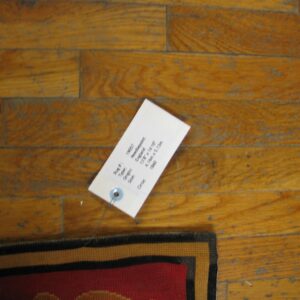 Close-up of the tag for Rug #19057 Needlepont by Rugs On Net. by Rugs On Net