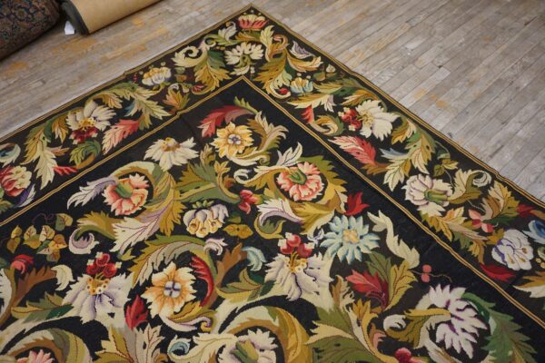 Close-up corner detail of a floral aubusson rug on a wooden floor by rugs on net