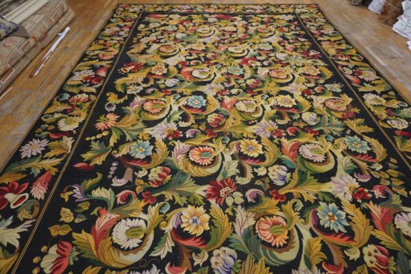 A vibrant floral aubusson rug pattern on a dark background by rugs on net. By rugs on net