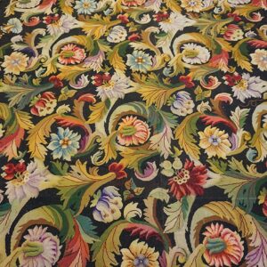 Close-up of a dark Aubusson rug featuring vibrant floral and acanthus leaf motifs in gold, red, and blue hues by Rugs On Net. by Rugs On Net