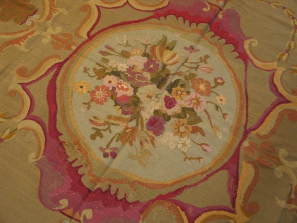 Close-up of a floral medallion detail on a tapestry rug by rugs on net. By rugs on net