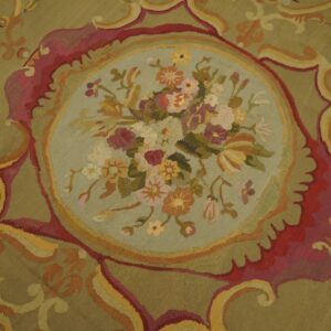 Close-up of a tapestry rug featuring a central floral medallion on a sage background, by Rugs On Net