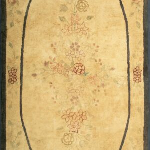 Early 20th Century American Hooked Wool Rug Featuring an Aged Beige Field and Soft Ivory Tones Carpet by Rugs On Net