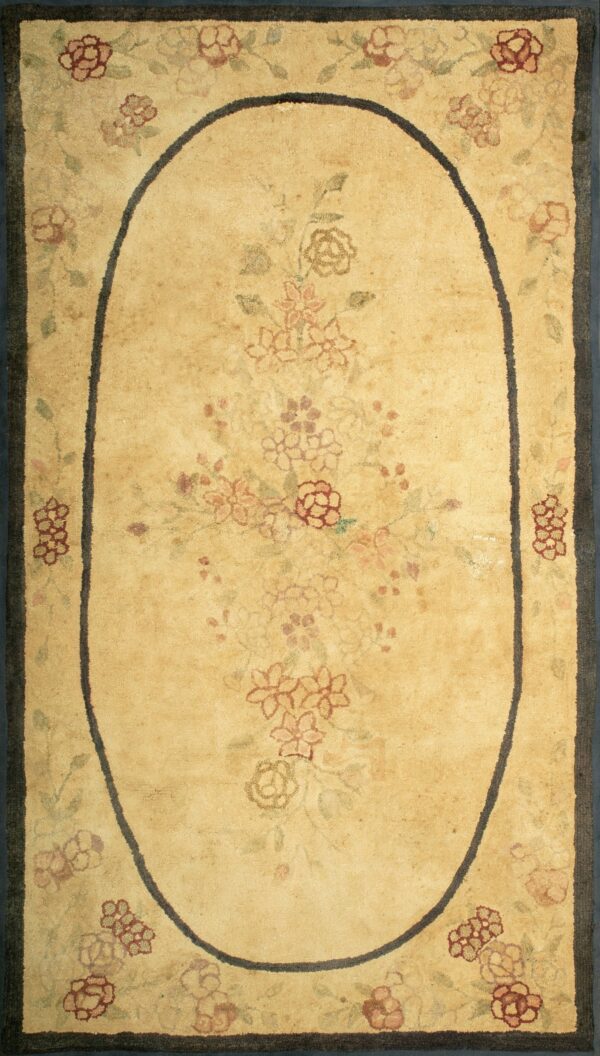 Early 20th century american hooked wool rug featuring an aged beige field and soft ivory tones carpet by rugs on net