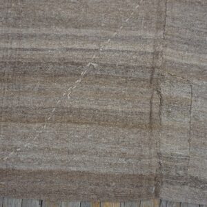 Close-up texture of a natural brown striped kilim rug by Rugs On Net. by Rugs On Net