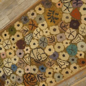 Close-up of a colorful floral hook rug pattern by Rugs On Net. by Rugs On Net