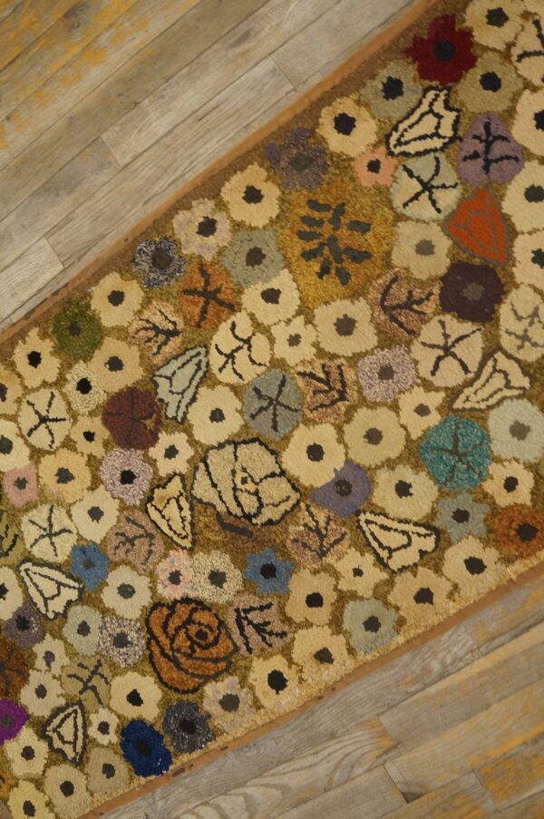 Close-up of a colorful floral hook rug pattern by rugs on net. By rugs on net