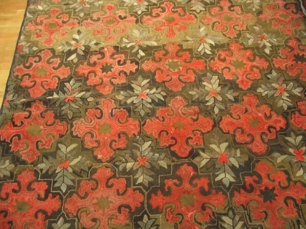 Close-up of a richly patterned rug featuring bold, stylized red medallions on a dark olive ground by rugs on net. By rugs on net