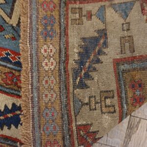 Close-up of the woven texture and geometric patterns of the Tribal Kilim Rug by Rugs On Net. by Rugs On Net