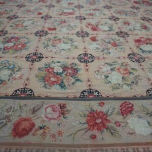Close-up of a floral tapestry rug with pink and cream tones by Rugs On Net. by Rugs On Net