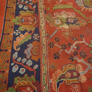 Close-up of the field and border detail of a richly colored rug by Rugs On Net. by Rugs On Net