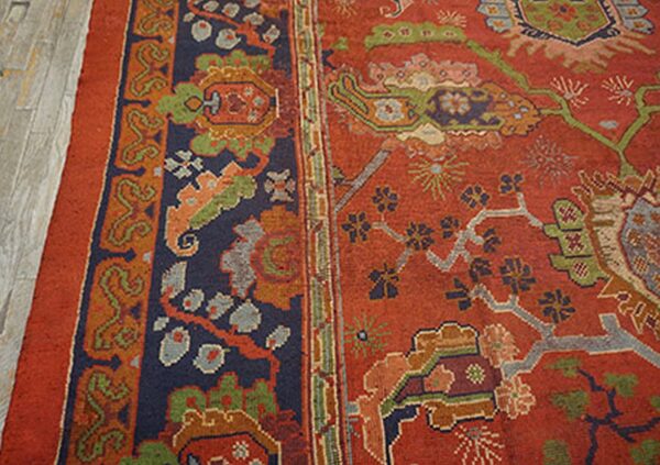 Close-up of the field and border detail of a richly colored rug by rugs on net. By rugs on net