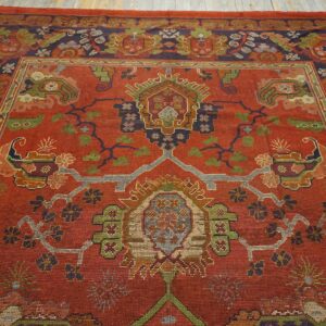 Close-up of a richly detailed red rug with intricate geometric and floral patterns, by Rugs On Net. by Rugs On Net