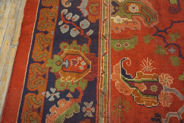 Close-up of vibrant geometric patterns and rich colors on the rug by rugs on net