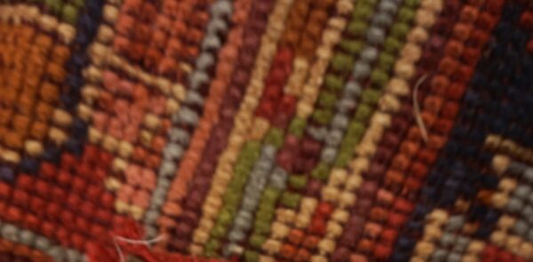 Close-up of the colorful woven texture of the oriental runner rug by rugs on net. By rugs on net