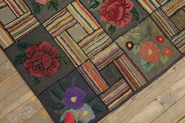 Close-up of a hooked rug with floral squares and striped patchwork by rugs on net. By rugs on net