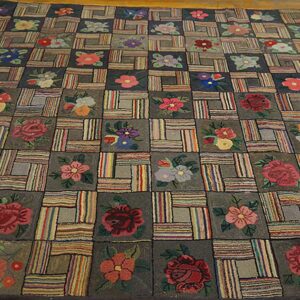 A colorful hooked rug featuring a patchwork design with individual squares containing floral motifs, titled 'Floral Patchwork Rug' by Rugs On Net. by Rugs On Net