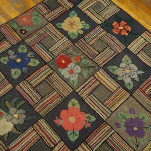 Close-up of a colorful floral hooked rug with a patchwork lattice design by Rugs On Net