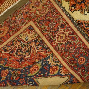 Close-up corner detail of a richly colored, traditional Persian rug by Rugs On Net. by Rugs On Net