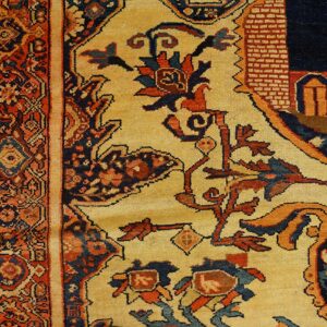 Close-up detail of a richly colored Oriental rug border with floral motifs on a cream field, by Rugs On Net