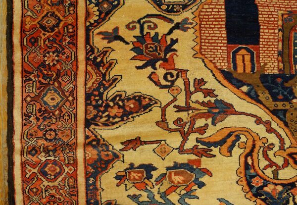 Close-up detail of a richly colored oriental rug border with floral motifs on a cream field, by rugs on net