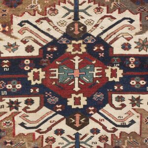 Close-up of geometric patterns and rich colors on an antique rug by Rugs On Net. by Rugs On Net