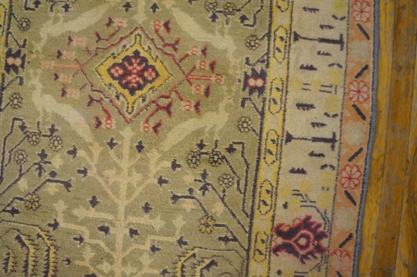 Close-up of a green and red patterned rug detail by rugs on net