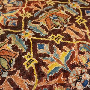 Close-up of the intricate floral and geometric patterns on the dark red Persian Rug by Rugs On Net. by Rugs On Net