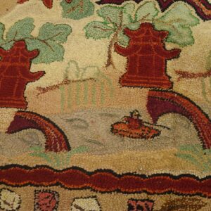 Antique rug with floral patterns.