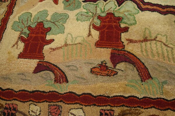 Antique rug with floral patterns.