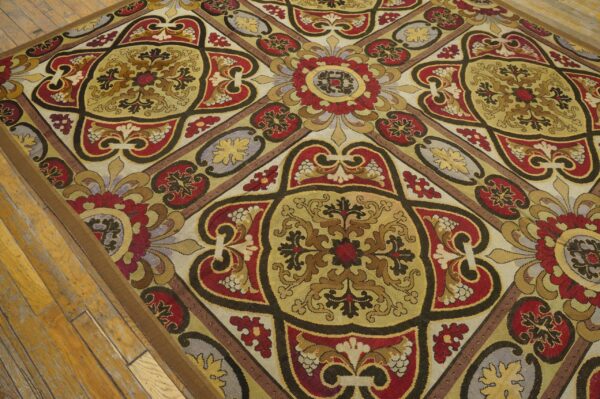 Close-up of a richly patterned rug with red, gold, and brown tones, featuring ornate medallion motifs, by rugs on net. By rugs on net
