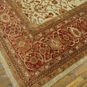 Close-up corner detail of a traditional red and beige area rug by Rugs On Net. by Rugs On Net