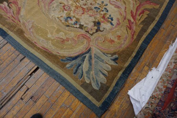 Elegant floral patterned antique carpet