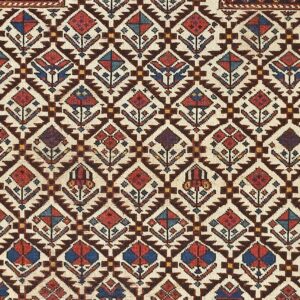 Close-up of a geometric Caucasian rug pattern with diamond motifs by Rugs On Net