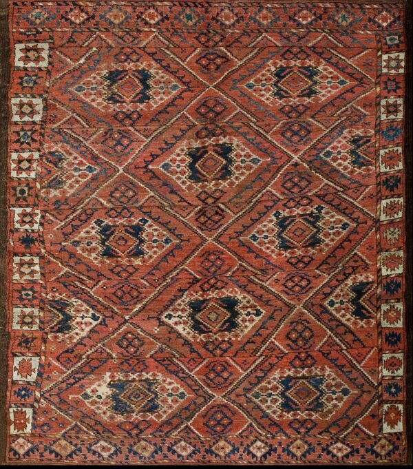 Late 19th century hand knotted afghan ersari beshir wool rug featuring madder and indigo accents carpet by rugs on net