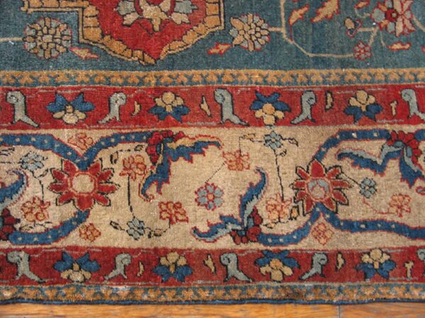 Close-up of a detailed border pattern on the persian rug by rugs on net