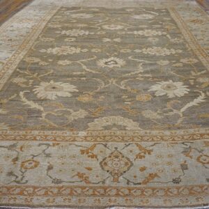A large, traditional rug in muted sage and tan with floral motifs, by Rugs On Net. by Rugs On Net
