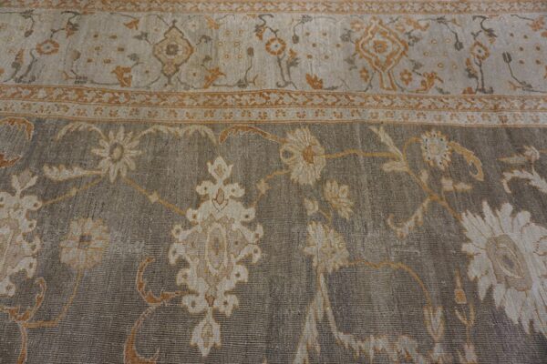 Close-up of a gray and beige floral rug pattern by rugs on net. By rugs on net