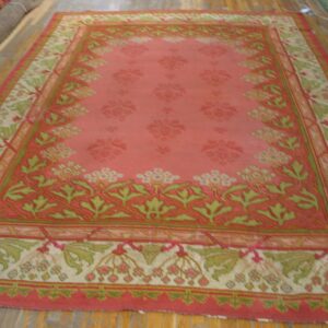 Close-up of a pink and green floral rug design by Rugs On Net. by Rugs On Net