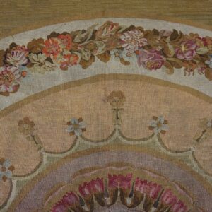 Close-up of a floral tapestry border featuring pink, blue, and white blossoms against muted tones, by Rugs On Net