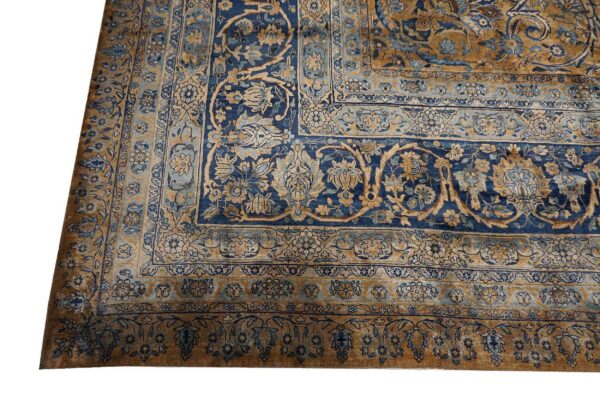 Close-up of a blue and gold persian rug corner design by rugs on net