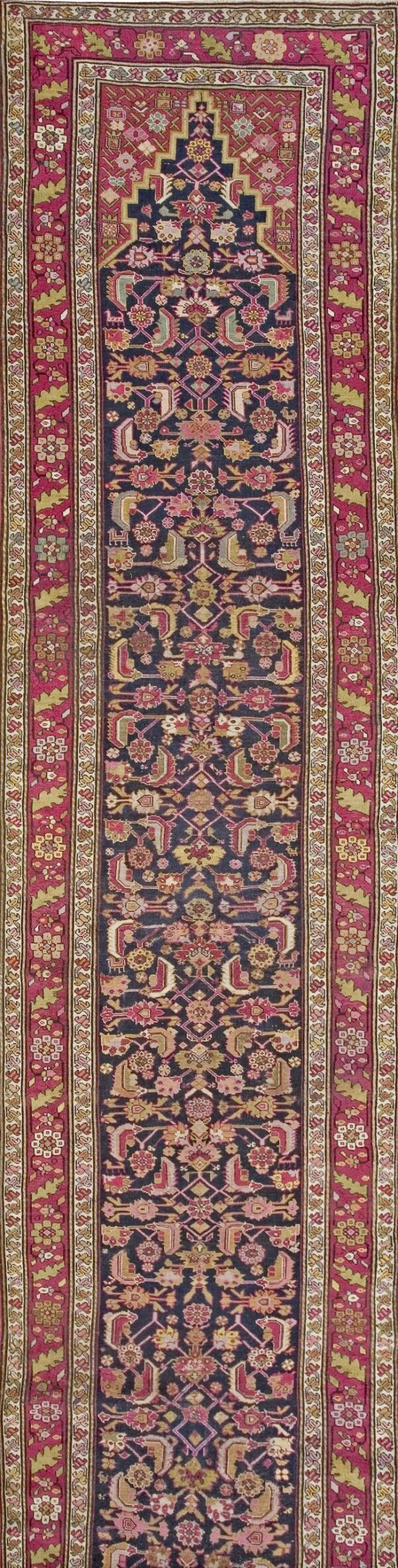 Close-up of a dark field rug with magenta borders, featuring geometric and floral motifs, by rugs on net