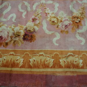Close-up of a pink floral rug with ribbon accents by Rugs On Net. by Rugs On Net