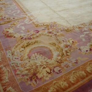 Close-up of a pink and cream floral Aubusson-style rug border by Rugs On Net. by Rugs On Net