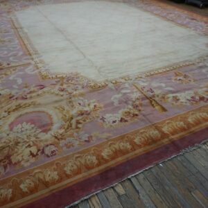 Close-up view of a large floral rug with pink and cream tones by Rugs On Net